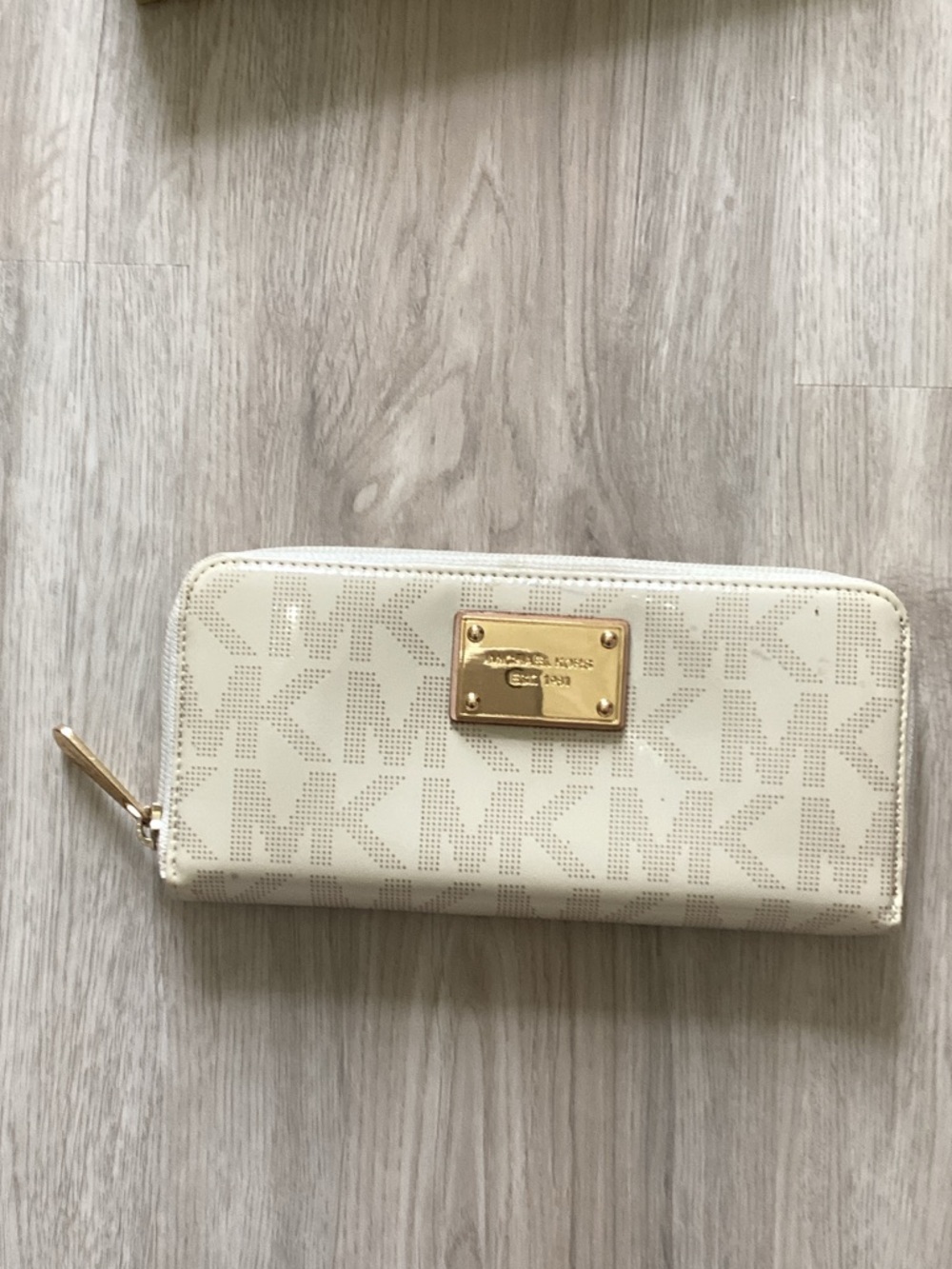 Michael Kors Cream Perforated MK Zip Wallet with Gold Plaque